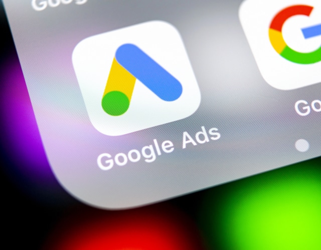 Google Ads app icon on phone